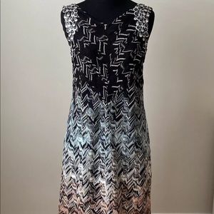 Missoni sleeveless chevron knit dress with paillettes.